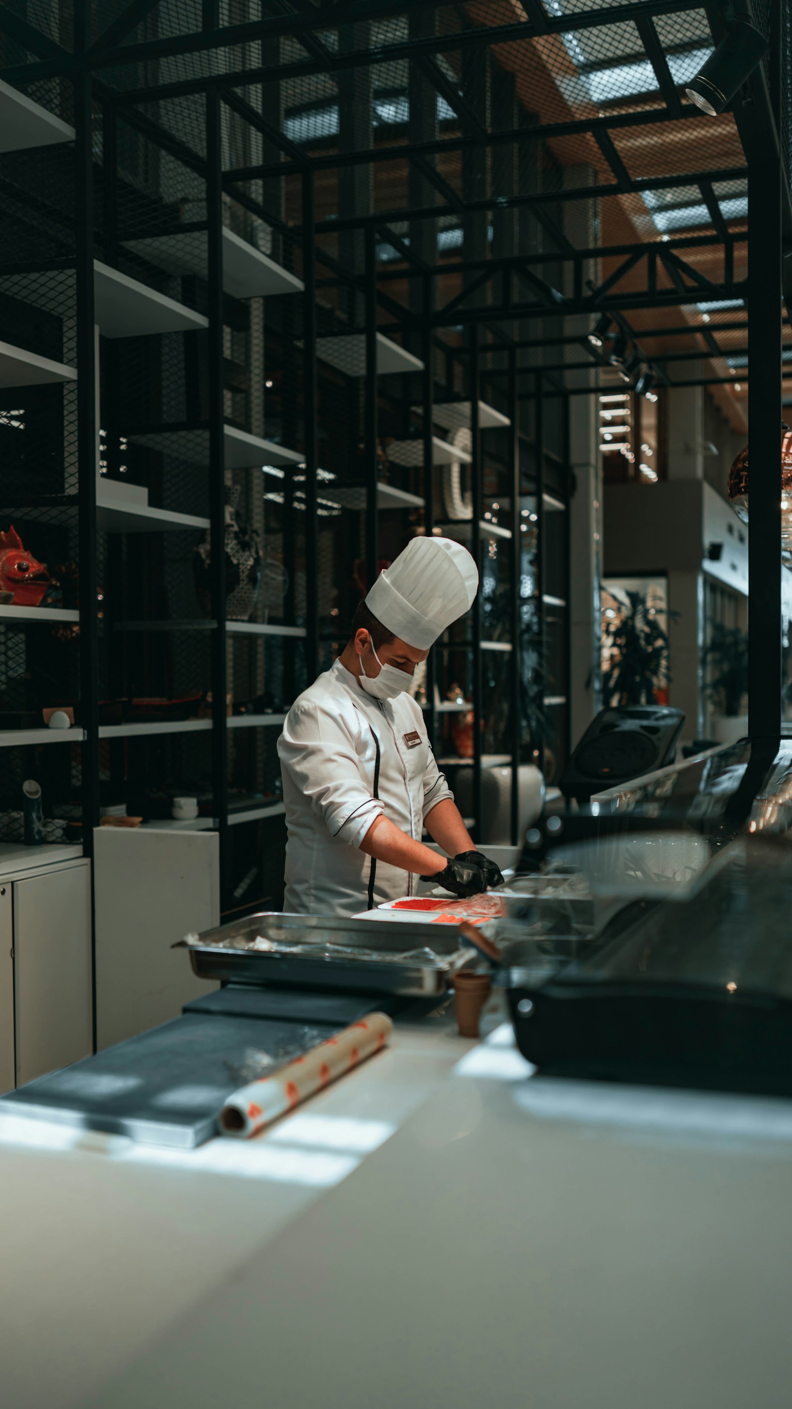 A restaurant chef preparing an order in the kitchen